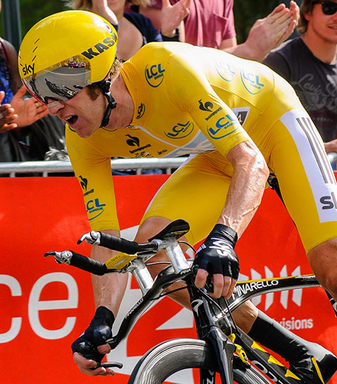 SIR BRADLEY WIGGINS em 2013 - Ciclista britânico que tem oito medalhas olímpicas, iniciando com um Bronze nos Jogos Olímpicos de Verão de 2000, um Ouro, uma Prata e dois Bronzes nos Jogos Olímpicos de Verão de 2004 e mais três medalhas de ouro nas Olimpíadas de 2008, 2012 e 2016.  Condecorado em 2013 
