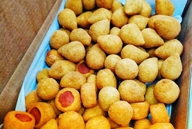 Brasileiros estão trocando refeições por salgados e biscoitos