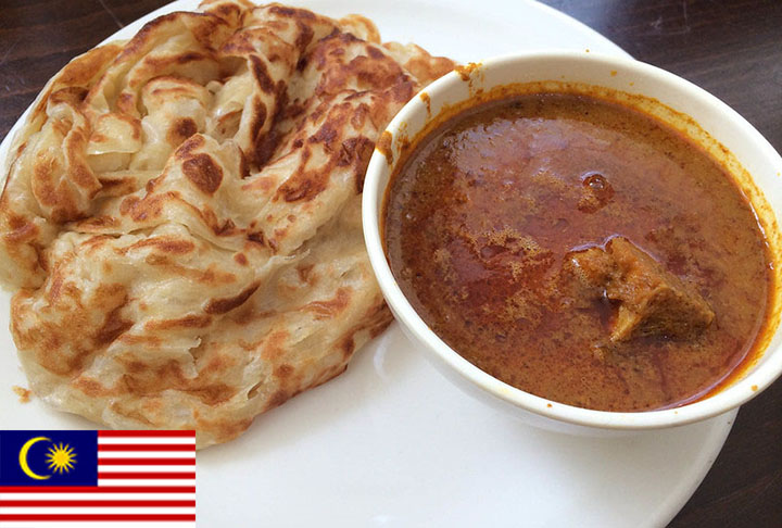 2º lugar - Roti Canai (Malásia) - Pão achatado servido com curry que tem variações doces e salgadas e pode levar carne, ovos ou queijo. -Flickr secretlondon123