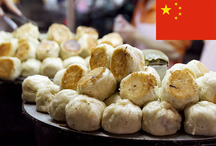 12º lugar - Shengian Mantou (China) - Baozi (pão cozido no vapor), pequeno e frito, recheado com carne de porco e gelatina que derrete formando uma sopa quando cozido.-Flickr Robyn Lee