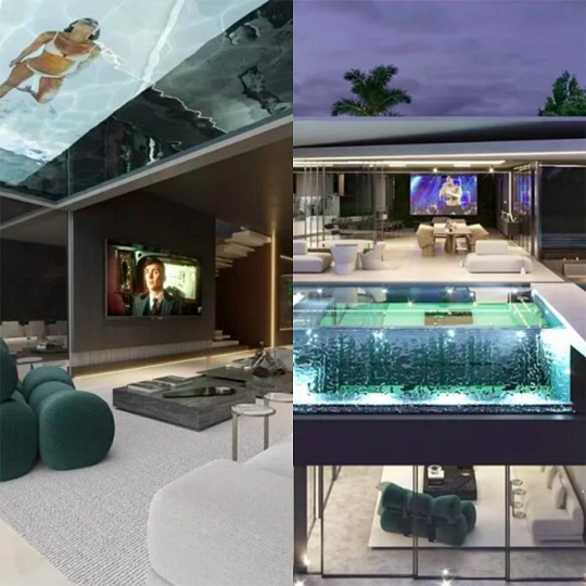 Não olhe para cima: O cantor Léo Santana e sua esposa, Lore Improta, não economizaram na excentricidade e construíram uma piscina com fundo de vidro no teto da sala de casa! 