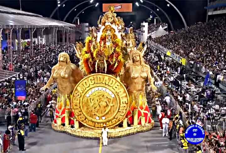 A Mocidade Alegre foi tricampeã do Grupo Especial do carnaval de São Paulo em 2014. Foi o segundo tricampeonato da história da escola (o outro tinha sido entre 1971 e 1973). Assinado pelos carnavalescos Sidnei França e Márcio Gonçalves, o desfile encantou o público ao falar sobre as diferentes maneiras de vivenciar a fé. - Reprodução/Youtube