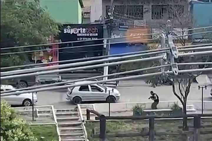 Universidade suspende aulas após morte de estudante em tiroteio entre milicianos no RJ - Reprodução de vídeo G1