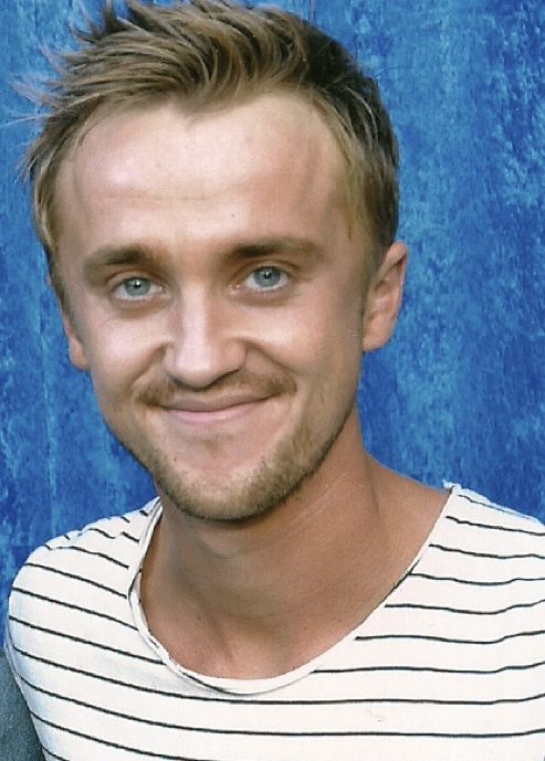 Seu nome completo é Thomas Andrew Felton. Ele nasceu em 22 de setembro de 1987, em Londres, Inglaterra, começando a atuar aos oito anos em comerciais e pequenos papéis.