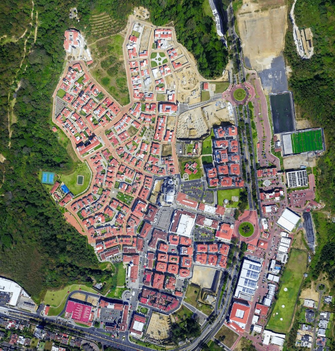 Em 2003, os arquitetos Pedro Pablo Godoy e María Sánchez apresentaram aos investidores a visão de uma "cidade planejada" compacta, onde tudo estaria a apenas 10 minutos de caminhada.