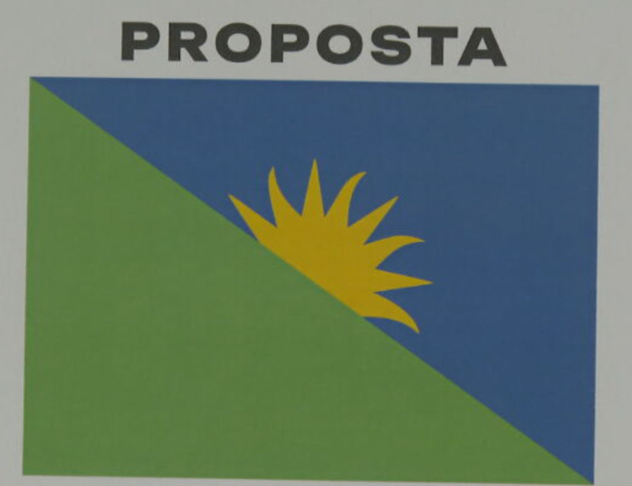 A proposta de substituição da bandeira de Belo Horizonte tramitou na Câmara Municipal em 2023, e a lei foi sancionada em agosto de 2023. O projeto foi apresentado por parlamentares depois que o designer gráfico Gabriel Figueiredo criou a nova identidade, com menos elementos na bandeira: apenas verde e azul, com um sol.-Reprodução TV Globo