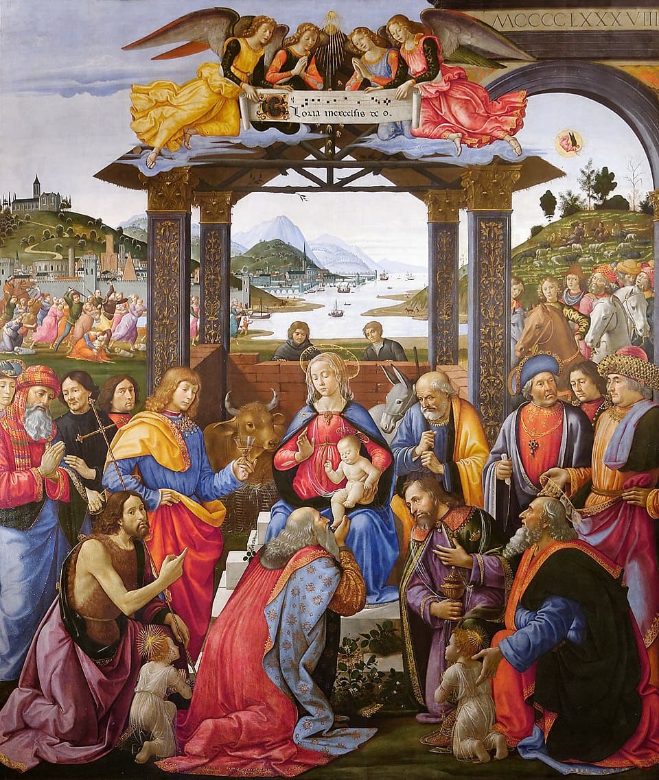 A Adoração dos Magos, de Domenico Ghirlandaio, foi criada entre 1485 e 1488 no estilo renascentista e mostra os Reis Magos homenageando o Menino Jesus. O cenário tem rica arquitetura e personagens vestidos com trajes da Florença da época.-domínio público