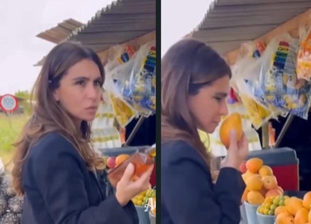 Giovanna Antonelli se encanta e cheira frutas à beira da estrada