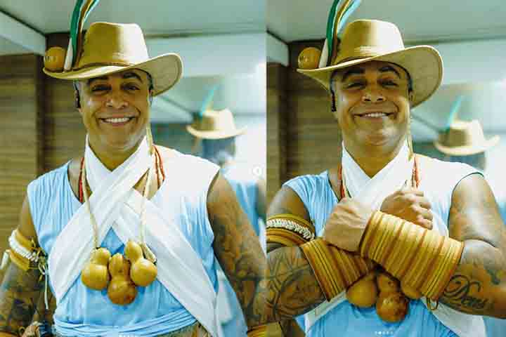 <p>As cores azul e branco, inspiradas no orixá Oxóssi, são marca registrada do Ara Ketu. Elas aparecem em fantasias, cenários e materiais gráficos, reforçando a identidade visual do grupo. Essa estética conecta espiritualidade e cultura popular.</p>
