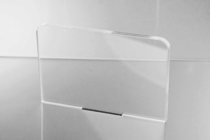 Display de acrílico - Reprodução