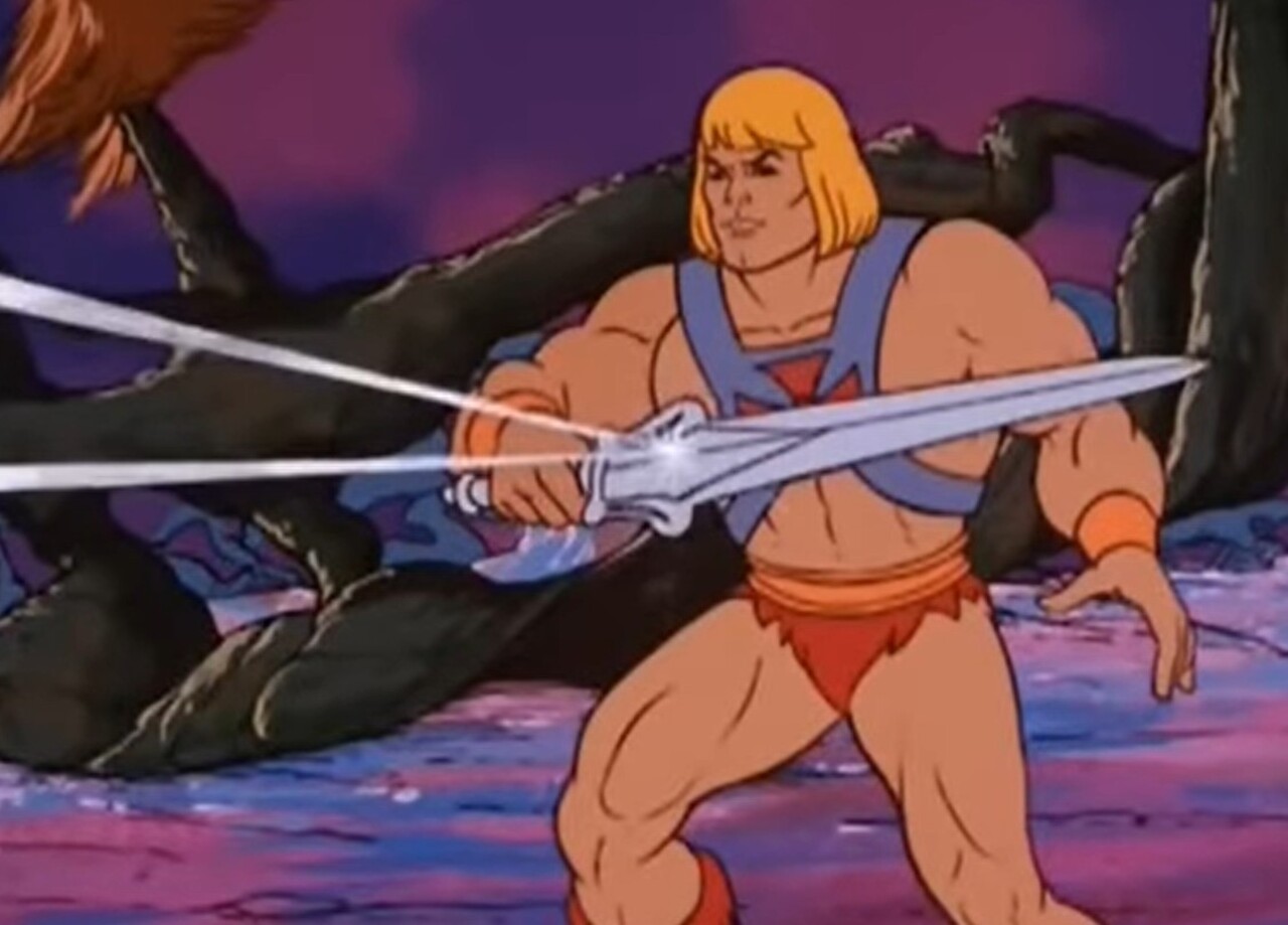 Na história, Adam é o príncipe de Eternia e guarda um importante segredo. Ao erguer a Espada do Poder e pronunciar sua famosa frase de transformação, ele se torna He-Man, o homem mais poderoso do universo.