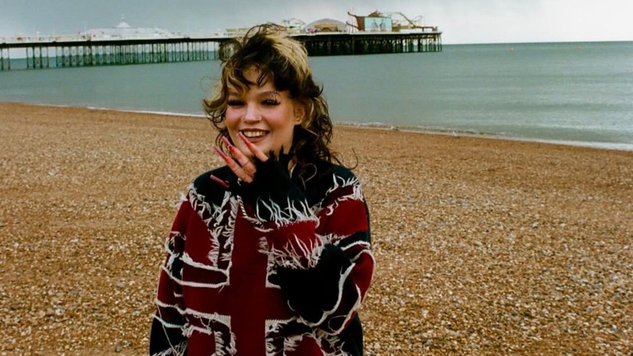 Nascida em 4 de janeiro de 2001, em Londres, Lola Emily Mary Young cresceu no sul da capital britânica. Ela estudou na BRIT School, escola que também formou artistas como Adele e Amy Winehouse. A trajetória musical da cantora começou ainda na adolescência, em competições de talentos no Reino Unido.
